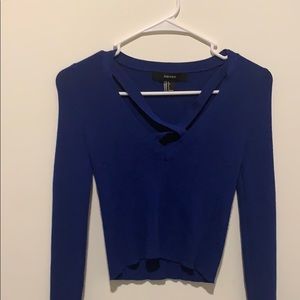 Blue long sleeve shirt.